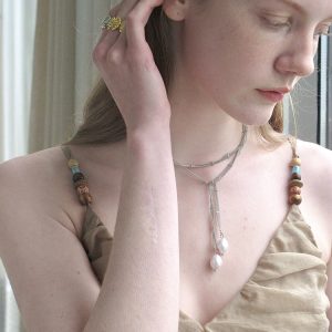 Elegant Minimalist Pearl Wrapped Necklace - Versatile Clavicle Chain for Women, High-End Layered Design for Socialite Style
