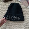 Slouchy Black Wool Hat with "My Head is Not Round" Lettering - Cozy Winter Knitted Beanie for Ear Protection